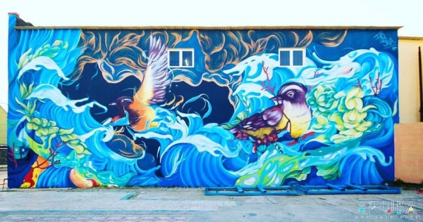 Graffiti na betonových kvádrech a asfaltové ploše v ul. Dukelských hrdinů